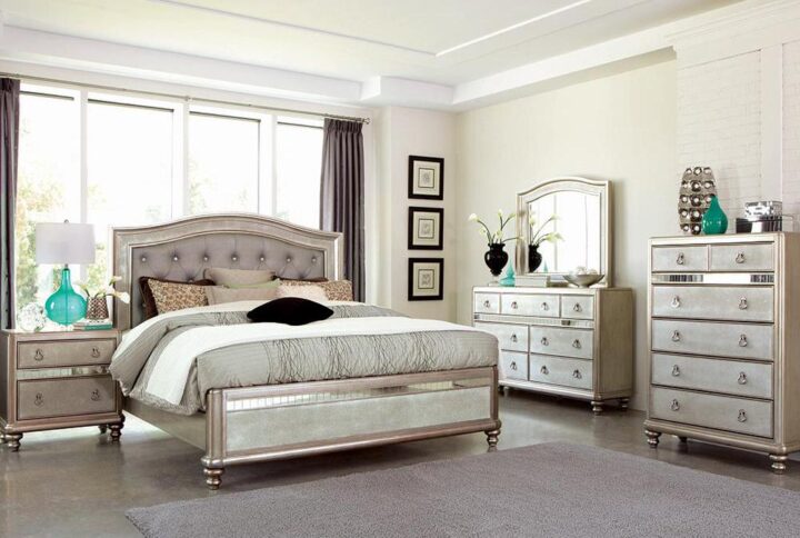 This beautiful five-piece bedroom set exudes luxurious glamour and convenient functionality. Its exquisite design will amplify your decor with an air of modern opulence. This set is brought to life by a shimmering metallic finish
