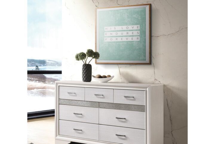 Infuse your space with sophisticated grace. The chic design of this beautiful dresser lends a touch of elegance to any bedroom. Felt-lined drawers keep delicate belongings safe and secure. A hidden jewelry drawer offers a discreet place to store your valuables. Complete with a glittery panel across the front