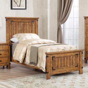 The Brenner collection brings you this countryside-inspired bed. It features elegant bucolic styling and classic clean lines. Both the imposing headboard and low footboard are built with handsome vertical paneling. The bed is finished in rustic honey with contrasting wood grain accents for a rustic appeal. This bed is perfect for a home with a pastoral