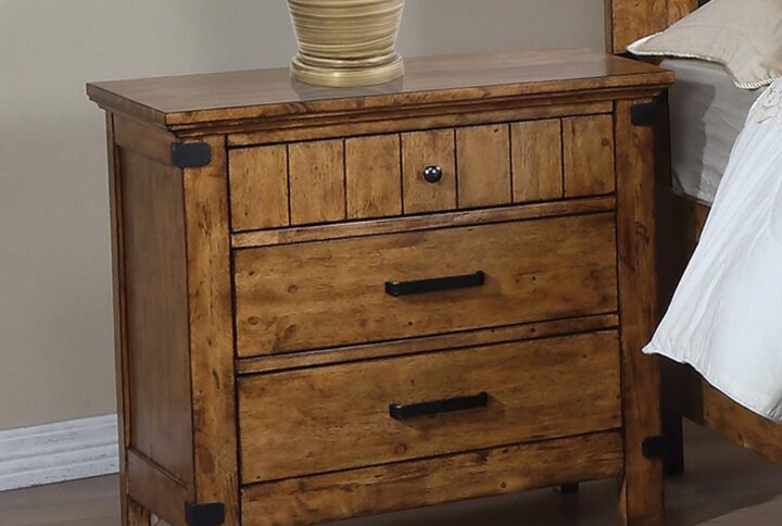 Embrace your love of the outdoors with this stylish three-drawer nightstand. Full of rustic charm