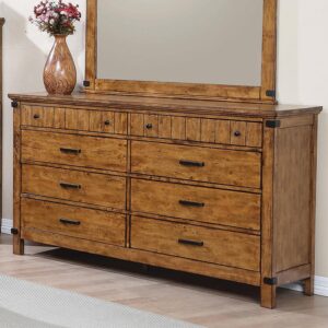 rustic charm in a guest or master bedroom. This wooden dresser is finished in a gorgeous shade of rustic honey
