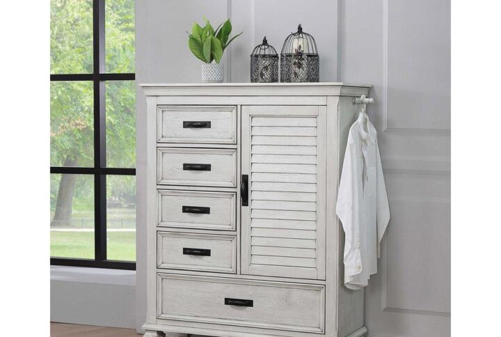 Exquisite detailing and versatile storage options make this wooden door chest a fashionable and functional choice. Inspired by island resort style