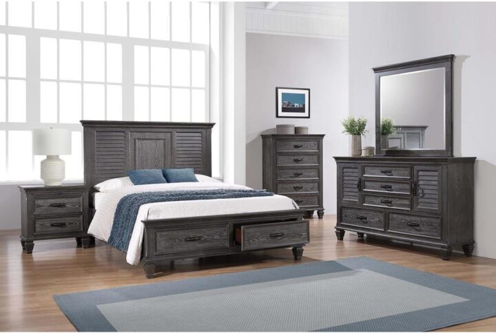 Your keepsakes are safe and sound with this four-piece storage bed set. A platform storage bed is crafted with two built-in drawers on the footboard with soft-closing glides. Shutter-style accents and crown molding enhance the headboard along with the five-drawer dresser with two side cabinets and a matching mirror. A two-drawer nightstand enhanced with black bar pulls and the same crown molding. Find a place for cord access inside the nightstand to easily charge smart devices while you snooze.