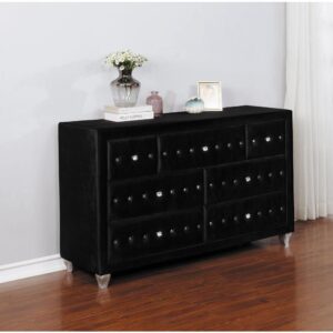Add modern glamour to a young adult's bedroom with this seven-drawer black dresser. The ultimate luxury