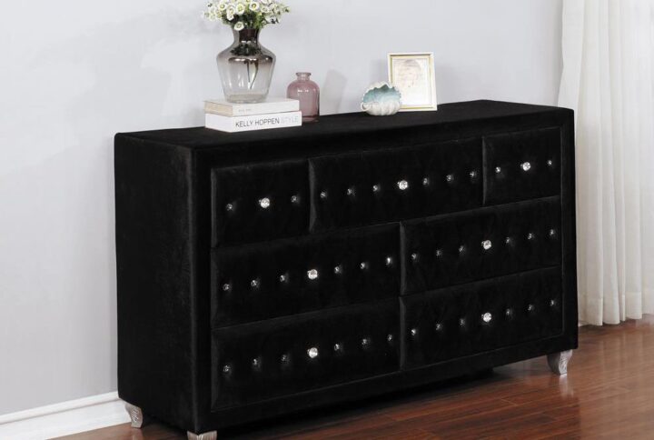 Add modern glamour to a young adult's bedroom with this seven-drawer black dresser. The ultimate luxury