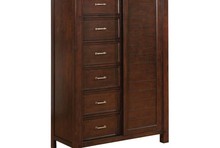 Add convenient storage and glamorous style to your bedroom decor. This gorgeous door chest boasts a stunning finish of rich pinot noir accentuated by striking metal drawer handles. Subtle