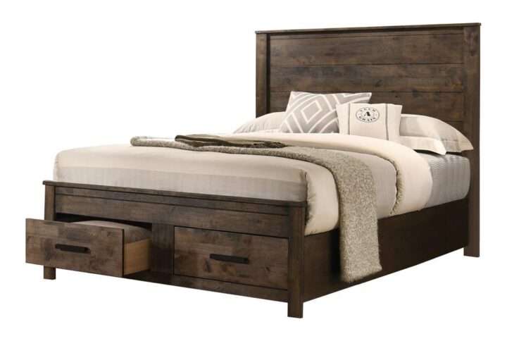 This transitional bed brings a blend of classic style and modern conveniences. It features an imposing headboard and storage footboard in a platform design. The full matte rustic golden brown finish includes beautiful wire brushed wood grain details for a cozy countryside allure. The storage drawers in the footboard are crafted with wooden pull handles. Solid block legs add the final detail to this magnificent bed.