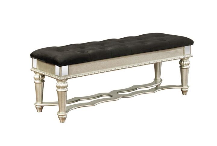 Put the final touch of luxury in that glamorous bedroom with this upholstered bench from the Heidi collection. This upholstered dressing bench displays a shimmering metallic platinum finish