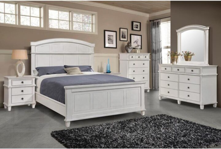 Stylize a casual transitional master or guest suite with this elegant bedroom set. With an antique white finish and lovely antique brass hardware