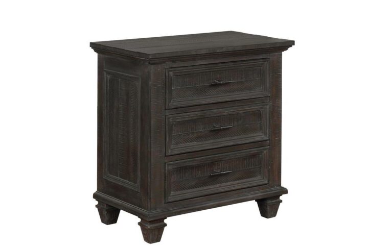 Rough sawn effect brings a hint of the rustic to this nightstand from the Atascadero collection. Transitional style harmonizes with the past and present for timeless appeal. Weathered carbon and matte black finishes complement the planked elements of the piece. Connect your devices with the built-in USB charging ports. Drawers float open and closed along 45 mm metal glides.