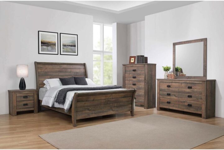 With a rustic sleigh bed and a plank style head and footboard