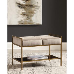 Sink into the plush cushions from this modern gold bench. Ideal in any space