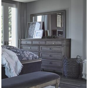 as well as with a removable jewelry tray. Turned tapered legs add a graceful touch to this majestic dresser.