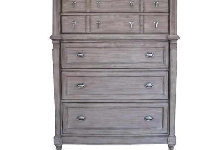 Bestow your home with the elegant ambiance of the updated transitional design of this five-drawer chest. It's crafted in a gorgeous classic French neoclassical design reimagined for today's discerning perspective. It features a stunning sand blasted wood finish with just the right amount of charming French grey. The drawers are fashioned with antique silver metal finished pendant and ring pull hardware