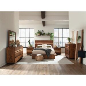 This expertly fashioned five-piece bedroom set offers durability and style suited for any master bedroom. Each piece comes with a smokey walnut finish with contrasting wood grain accents that is both modern and timeless. The eastern king bed has a platform design for the mattress and a two-piece headboard with a stylishly full-length opening. The nightstand
