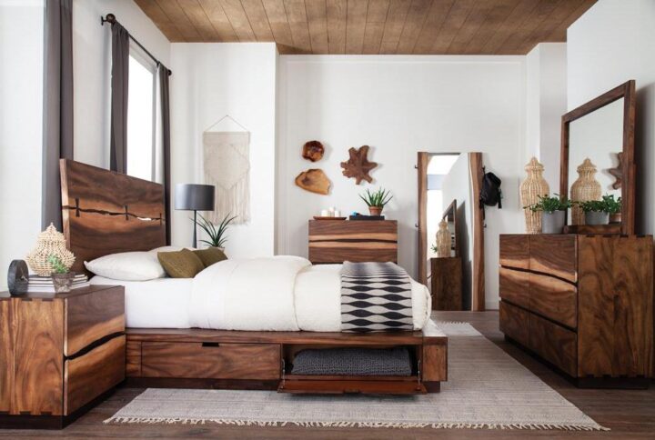 Casual country style meets functional practicality in this five-piece bedroom set for the master bedroom. Each piece is expertly finished in a casual smokey walnut design complete with wood grain accents. The eastern king bed features a stylish two-piece headboard and side compartments under the bed for ample storage. The accompanying chest