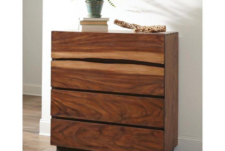 Upgrade your master bedroom's storage options. This versatile chest offers four large drawers to help you stay organized. Its gorgeous smokey walnut and coffee bean finish are enhanced by washed-out accents
