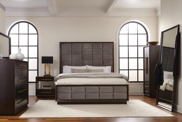 Create an interesting visual in a modern bedroom with the geometric features from this eastern king four-piece bedroom set. The high upholstered headboard adds depth and warmth with a smoked peppercorn finish. Versatile in style