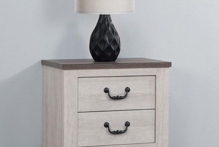 A striking two-tone transitional two-drawer nightstand brings a warm