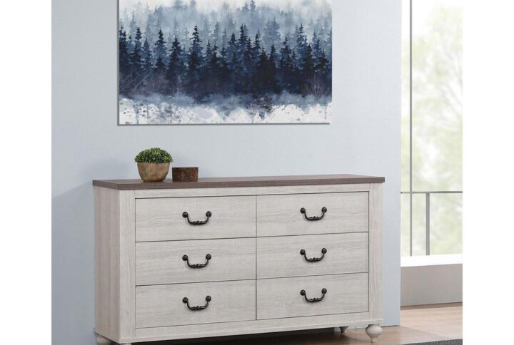 This two-tone transitional six-drawer dresser casts a warm