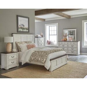 Achieve your dream of a country chic bedroom suite with this five-piece set. A lovely panel bed with a shutter-style headboard is the main attraction while the footboard is crafted with a solid panel design. Crown molding enhances all pieces