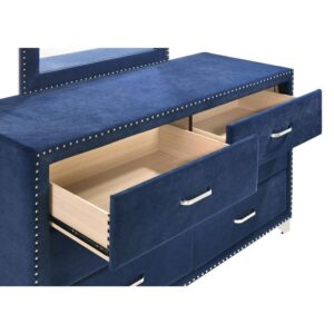 this dresser is a conversation starter. It is equipped with six spacious drawers to store your bedside items. Nail head trim makes a spectacular statement that matches the tapered legs. With its stunning and regal design
