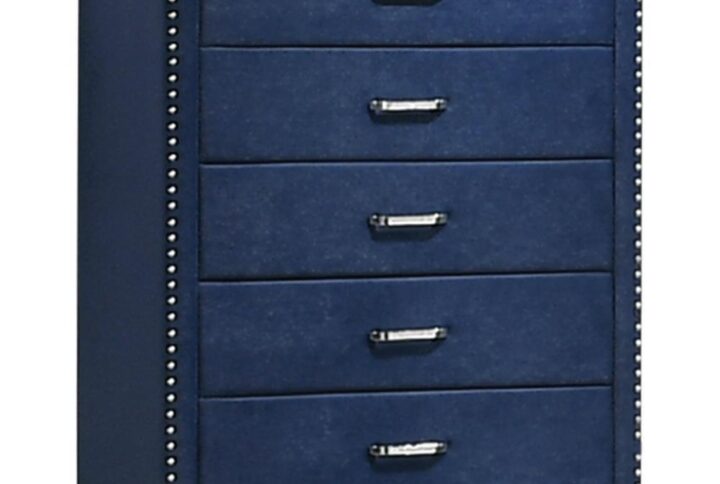 Three cheers for a chest that transforms your sleeping space. A five-drawer chest is readily equipped to store your garments while looking gorgeous. It's uniquely upholstered in velvet fabric for an extra luxurious impression. Nail head trim enhances the appearance while matching the tapered feet. This piece is a bold upgrade while offering a stylish storage solution.