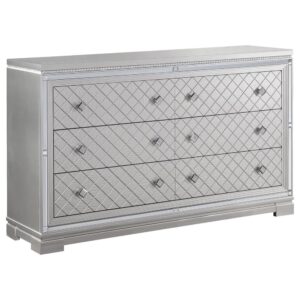crystal-encrusted knobs sparkle and reflective mirror trim outline the set of drawers. To further lend to the finish
