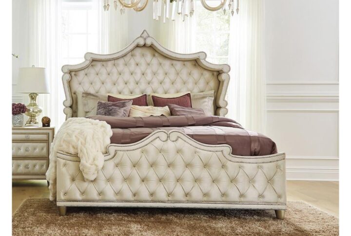 Exquisite traditional and modern flair is found within this grand upholstered bed. An oversized upholstered headboard offers a large recessed panel to create a small covered area