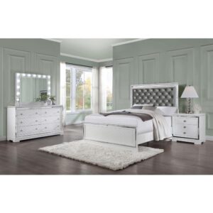 Sophistication and opulence merge to create this glam four-piece bedroom set