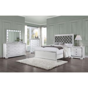 Understated elegance and luxe accents combine to create this glam five-piece bedroom set. Topped off with inlaid mirror trim tile borders