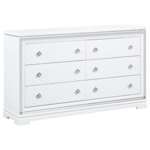 crystal-encrusted knobs sparkle and reflective mirror trim outline the set of drawers. To further lend to the finish