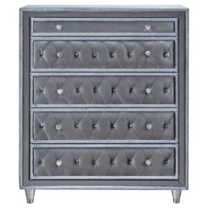the chest features button tufted drawer fronts studded with faceted buttons