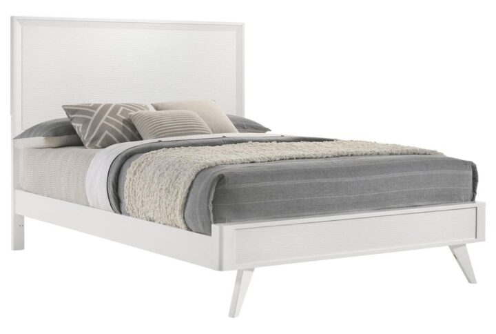 Experience the epitome of elegance with the Janelle collection's bed. With its distinctive wave-effect design