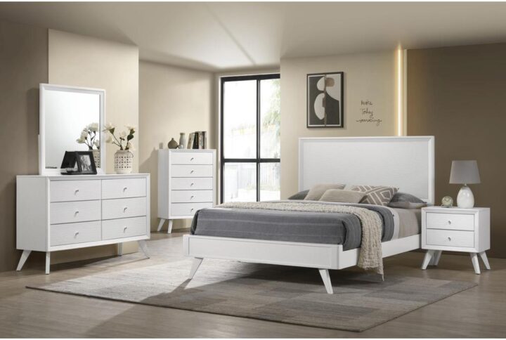 Make a statement in your bedroom with the Janelle collection. The wave-effect design on the front of each piece brings a distinctive touch to this collection. Along with its eye-catching design