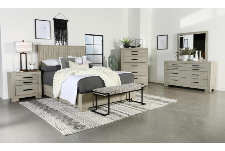 A neutral finish and clean lines direct the modern silhouetting of this five-piece bedroom set. This crisp