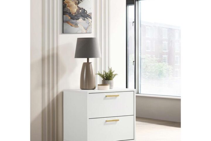 Flank your bedside with this modern glam nightstand. Designed with an elegantly understated