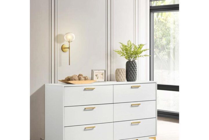 Maintain a cheerful and luxe bedroom with this splendid modern glam dresser. A perfect statement piece for contemporary bedrooms