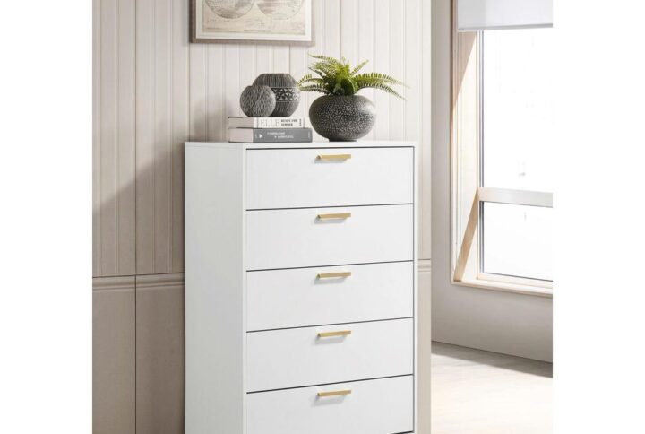 Open up your tight bedroom floor plan with this stately modern glam chest. Five spacious drawers stacked on top of one another keep garments and bedroom essentials stowed away and organized