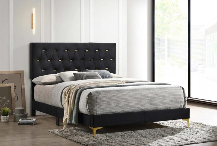 Transform your bedroom oasis into a dramatic interior with this modern glam panel bed. Upholstered in plush