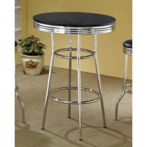 way back to the 50s with this soda fountain bar table. Black table top is wrapped in retro chrome rim. Chrome legs angle slightly out and come with a round footrest and a decorative ring just under the top. Who knew retro could be so fun? All you need is a server on roller skates to deliver your vanilla ice cream float topped with hot fudge and a bright red cherry.