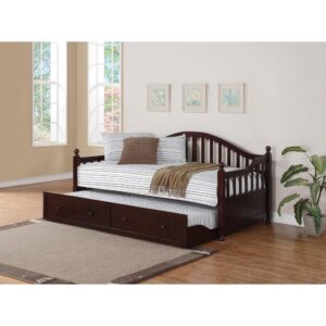 Add a dynamic enhancement to a teen's or child's room. Extra sleeping quarters in a guest room is also a benefit of this day bed with trundle. A stylish slatted design with a curved silhouette delivers an eye-catching enhancement. Deep cappuccino brings a finish that is both commanding and versatile. Solid pine construction with wood knobs and a convenient trundle highlight the features of this fabulous bed.