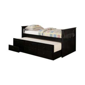 this solid wood day bed makes a stylish statement in a guest room. Its bold