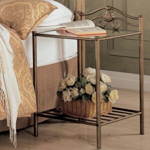 this metal nightstand turns the ordinary into the extraordinary. Stand is finished in antique brushed gold that warms any bedroom. It also features elegant swirling flower motifs. Glass top is a nice complement to the metal frame. Comes with bottom shelf perfect for fresh fragrant flowers.