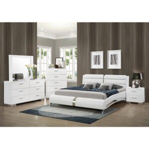 The Jeremaine collection presents this well-designed bed with a touch of class. It features straight lines and sumptuous curves for a contemporary allure. The headboard is fashioned with cushioned paneling for a unique look. The bed is stunningly finished in coated polyurethane that's polished to a high gloss. The chrome-like accents give this bed an exquisite appeal fit for any modern bedroom.