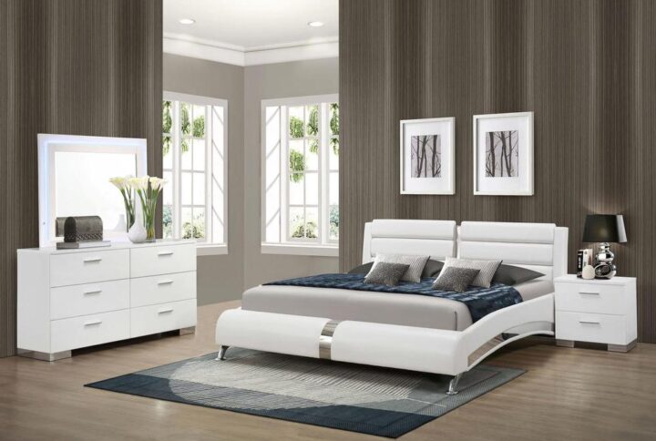 Outfit your modern bedroom with the energizing look of this bedroom set. Clean lines on case pieces contrast with the alluring curves of a stylish bed with a sectioned headboard and sleek chrome finish metal accents. Dresser