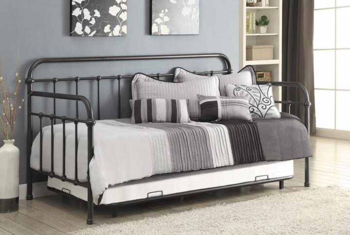 Both you and your overnight visitors will love this metal daybed for your guest room. Bed features a pull-out trundle for convenience. Simply styled with straight lines and a touch of curves to soften the look. You'll love its durable strong meal tubing and warm dark bronze finish. They'll love its versatility and comfort.