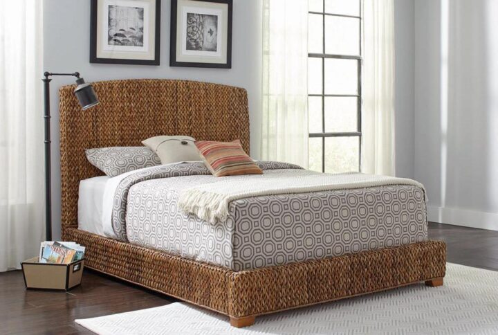 The tropical style bed from the Laughton collection is a handsome addition to the bedroom. Its frame is expertly crafted with mahogany solid wood and plywood for years of reliability. The bed is lovingly embellished with hand-woven banana leaf upholstered in an amber finish. It imparts a warm