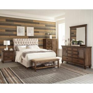 This delightful bed adds stylish elegance to the bedroom. The headboard is constructed with a handsome rolled design. The majestic headboard is also upholstered in luxuriant fabric with a button-tufted pattern with gorgeous individual nailhead trim. The solid wood-turned legs come in a warm cappuccino finish. This bed adds an element of grace and sophistication to the bedroom.