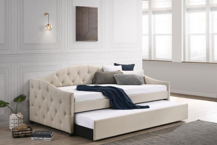 Sweeping lines and timeless details come together in this transitional twin daybed and trundle set. Wrapped in a soft fabric that coordinates with all sorts of color palettes